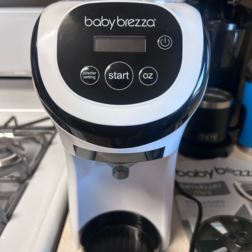 Baby Brezza Black and White Formula Dispenser..